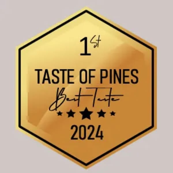 Gold hexagonal award for "1st Taste of Pines Best Taste 2024" with five stars.
